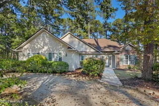 41 Pinewood Drive, Carolina Shores, NC 28467 – photo 1: 41 Pinewood Drive in Carolina Shores, NC