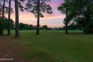 1705 River Drive, Morehead City, NC 28557 – photo 3: Stunning home on the golf course