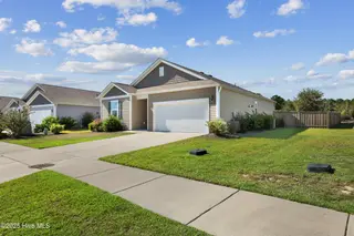 420 St Kitts Way, Winnabow, NC 28479 – photo 2: Front Sideview