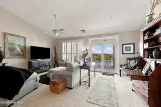 150 Lands End Court A42, Morehead City, NC 28557 — 3-bedroom condo in The Shores at Spooners Creek, Morehead City, NC, photo 12 of 50: Living to Balcony
