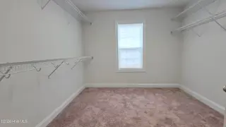 2007 Snapper Street, New Bern, NC 28562 — 4-bedroom home in Bluewater Rise, New Bern, NC, photo 22 of 31: 20 Enormous Primary Walk-in Closet
