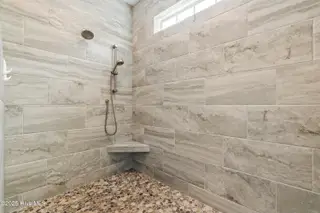 6475 Bryson Drive SW, Ocean Isle Beach, NC 28469 – photo 24: Tiled to the celing