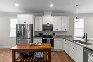 162 NW 9th Street, Oak Island, NC 28465 – photo 12: kitchen 1