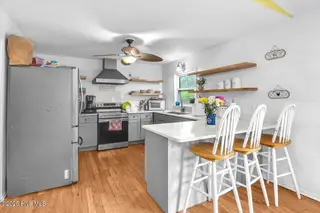 4407 E Oak Island Drive, Oak Island, NC 28465 – photo 16: 42-Final 4407 E Oak Island Dr-RJREM-8907