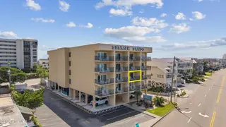 104 S Lumina Avenue S 203, Wrightsville Beach, NC 28480 — 1-bedroom condo in Summer Sands Condominiums, Wrightsville Beach, NC, photo 3 of 27: DJI_20260921125920_0029_D_1 (1)