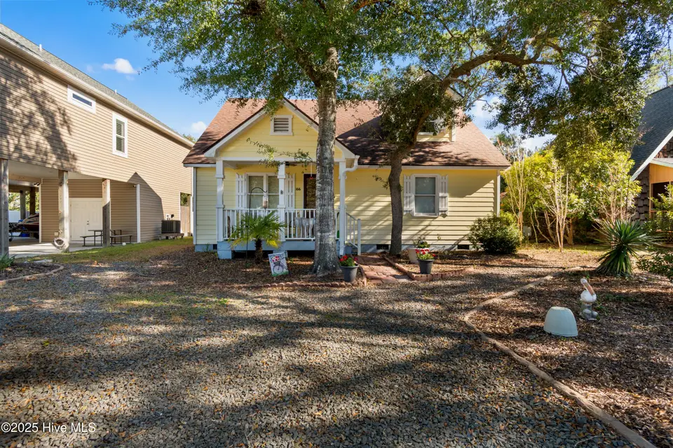 166 NW 7th Street, Oak Island, NC 28465 – photo 1 of 39: 166 NW 7th