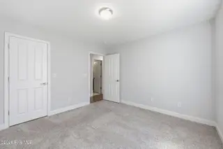 106 Heckathorne Drive, New Bern, NC 28560 — 3-bedroom home in West Crossroads, New Bern, NC, photo 21 of 33: Guest Room 2