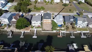 147 Swordfish Drive, Holden Beach, NC 28462 — 5-bedroom home, Holden Beach, NC, photo 8 of 12: canal drone view