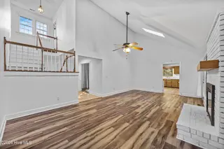 106 Heiress Wynd Drive, Jacksonville, NC 28546 — 3-bedroom home in Northside, Jacksonville, NC, photo 16 of 53: 16_living room