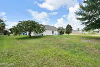 2947 Bay Village Street, Shallotte, NC 28470 — 3-bedroom home in Green Bay Village, Shallotte, NC, photo 2 of 33: Almost half acre, corner lot!