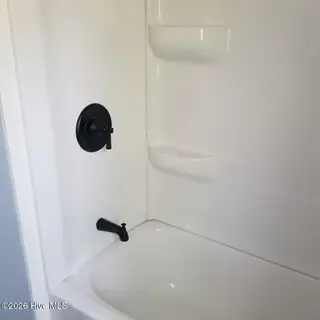 232 Lake Drive SW, Supply, NC 28462 — 3-bedroom manufactured home in Riverside, Supply, NC, photo 18 of 36: New Tub Shower