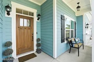 6479 Bryson Drive SW, Ocean Isle Beach, NC 28469 – photo 5: Low maintenance fiber cement siding
