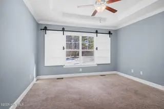 3389 Buffaloe Ridge Court, Rocky Mount, NC 27804 — 3-bedroom home in Tharrington Way, Rocky Mount, NC, photo 16 of 38: Primary Bedroom