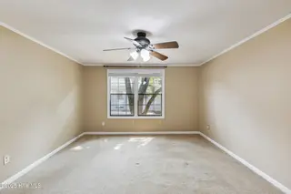 630 Dogwood Drive, Sunset Beach, NC 28468 – photo 14: Primary Bedroom