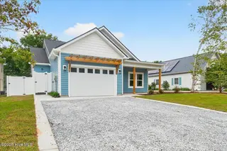 137 NE 3rd Street, Oak Island, NC 28465 – photo 2: Front of Home