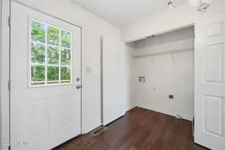 1402 Lockwood Road, Kinston, NC 28501 — 3-bedroom home in Brentwood, Kinston, NC, photo 13 of 37: Backdoor and Laundry Closet