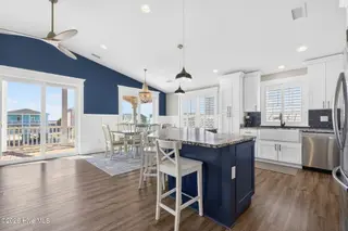 3228 E Dolphin Drive, Oak Island, NC 28465 – photo 13: KahunaPhoto.com-43