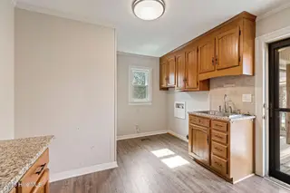 303 N Lincoln Street, Benson, NC 27504 – photo 24: Back Entry - Laundry Room