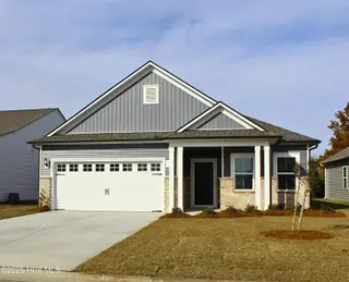 237 Eagle Claw Drive 3028, Carolina Shores, NC 28467 – photo 1: front- updated