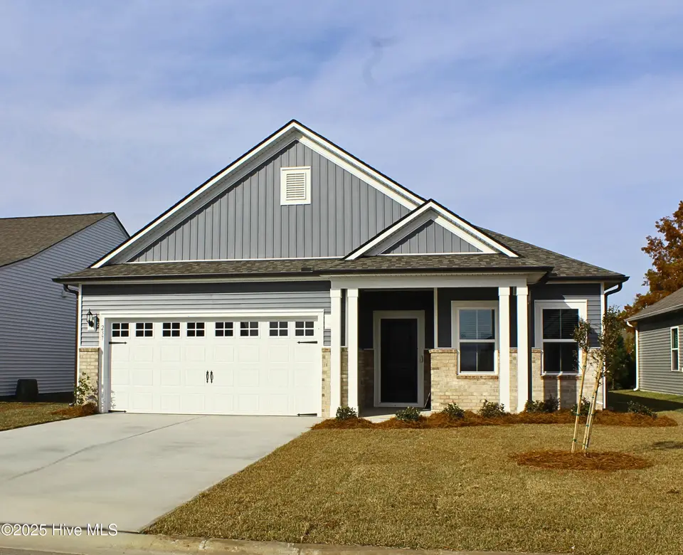 237 Eagle Claw Drive 3028, Carolina Shores, NC 28467 – photo 1 of 17: front- updated