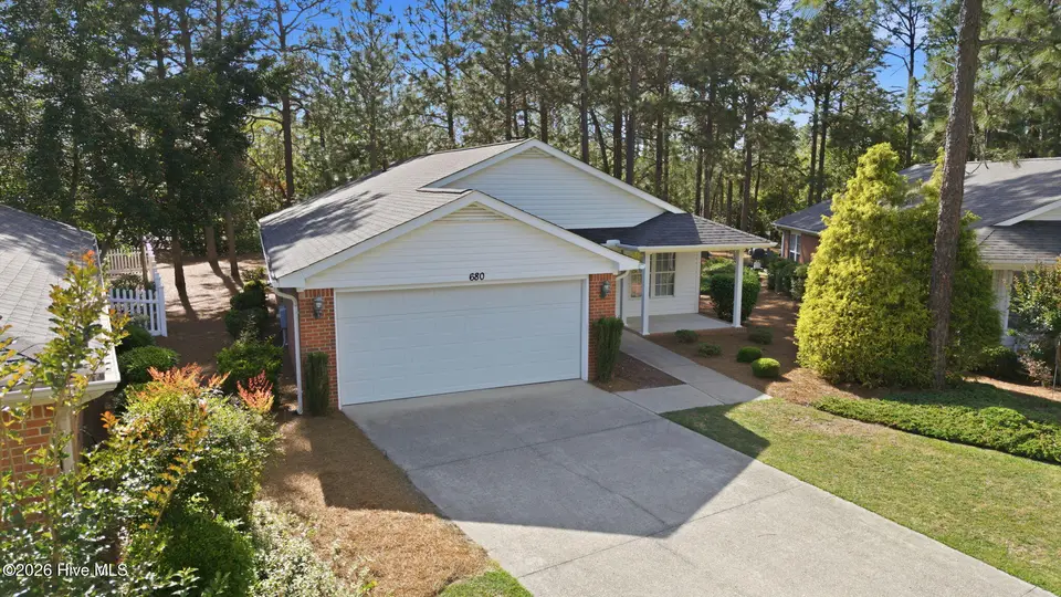 680 Pinehurst Trace Drive, Pinehurst, NC 28374 – photo 1 of 42: 2-web-or-mls-DJI_20260514170109_0322_D