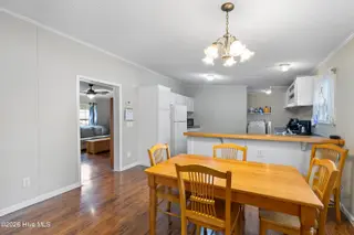 1109 Nautical Lane SW, Calabash, NC 28467 — 4-bedroom manufactured home in Village At Calabash, Calabash, NC, photo 12 of 34: Dining