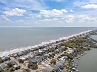 3909 W Beach Drive, Oak Island, NC 28465 – photo 20: 7-web-or-mls-DJI_20260408140033_0410_D