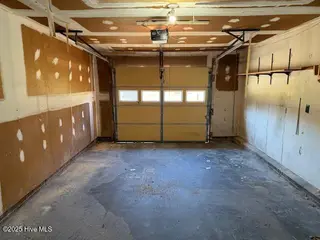 20 Chattawka Drive, Havelock, NC 28532 — 3-bedroom home in Greenfield Heights, Havelock, NC, photo 18 of 20: Attached Garage Interior View 1