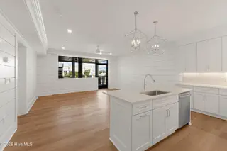 805 Mulberry Street Unit 112, Beaufort, NC 28516 — 1-bedroom condo in 805 Mulberry, Beaufort, NC, photo 13 of 24: Kitchen Island View To Porch