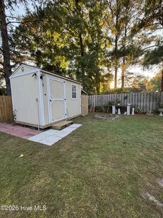 637 Lanvale Hills Circle, Leland, NC 28451 — 3-bedroom home in Lanvale Trace, Leland, NC, photo 15 of 15: Storage Shed