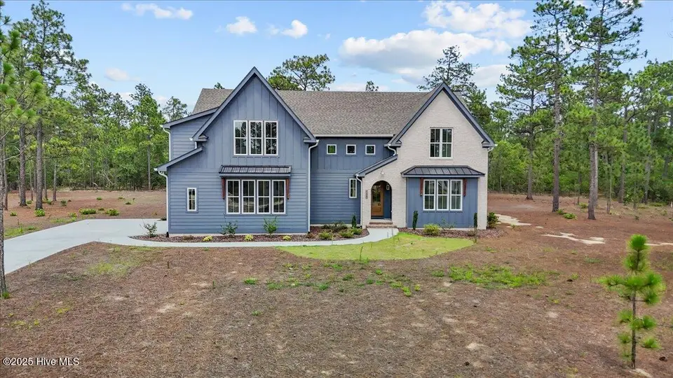 130 Sugar Sand Lane, West End, NC 27376 – photo 1 of 60: 130 SSL Front