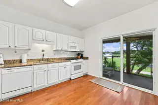 109 Oakleaf Drive, Pine Knoll Shores, NC 28512 – photo 23: Kitchen to Backporch