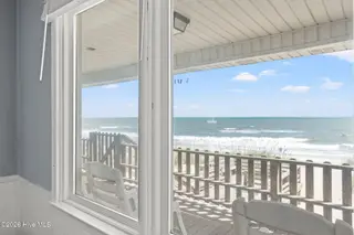 392 E First Street, Ocean Isle Beach, NC 28469 – photo 23: Right side primary bedroom