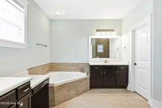 1454 Dunes Boulevard SW, Ocean Isle Beach, NC 28469 – photo 19: Spacious primary bath/toilet closet