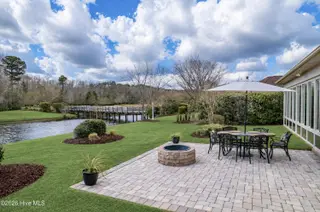 1092 Leesburg Drive, Leland, NC 28451 – photo 4: Side view of back patio green