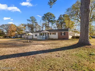 514 Seminole Trail, Jacksonville, NC 28540 – photo 6: 134098817724716563_134098817538519063_02