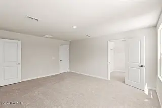 8031 Sterling Oaks Drive NW, Ash, NC 28420 – photo 16: Owner Suite