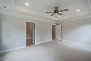 1025 Wood Creek Road NE, Leland, NC 28451 – photo 18: *REPRESENTATIVE PHOTO* Master Bedroom