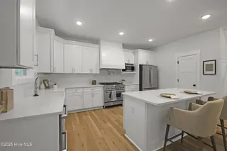 82 Northeast Drive NW, Calabash, NC 28467 – photo 10: 82NE Kitchen Island & Pantry side view
