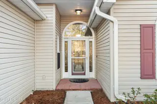 9 Golf Crest Court, Carolina Shores, NC 28467 — 3-bedroom home in Carolina Shores, Carolina Shores, NC, photo 2 of 46: Front Door