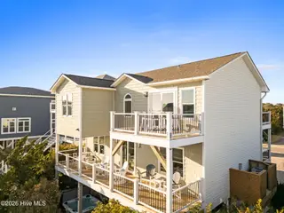 1116 E Beach Drive, Oak Island, NC 28465 – photo 2: Front Drone