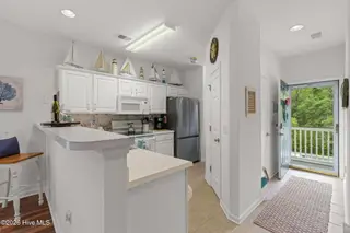 1008 Great Egret Circle SW D, Sunset Beach, NC 28468 — 2-bedroom condo in Sandpiper Bay, Sunset Beach, NC, photo 4 of 34: 10-web-or-mls-CamMediallc.com (16 of 28)