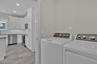 221 NE 75th Street, Oak Island, NC 28465 – photo 15: 221 NE 75th St-11