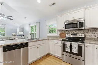 168 NE 3rd Street, Oak Island, NC 28465 – photo 17: 35-web-or-mls-dsc09792