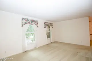 119 Pine Lake Drive, Whispering Pines, NC 28327 – photo 22: Living Room