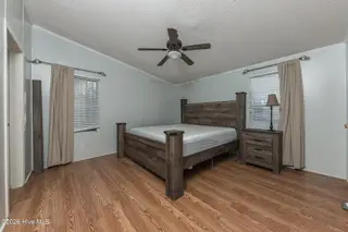 210 Creek Bank Drive, New Bern, NC 28560 — 3-bedroom manufactured home in Creekwater Haven, New Bern, NC, photo 24 of 58: MasterBed