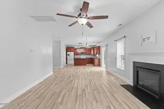 302 First Post Road, Jacksonville, NC 28546 — 4-bedroom home in Towne Pointe, Jacksonville, NC, photo 16 of 38: Family Room