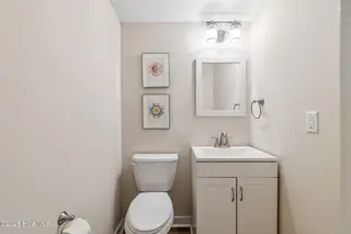 1616 Bonito Lane, Carolina Beach, NC 28428 – photo 17: Half bathroom