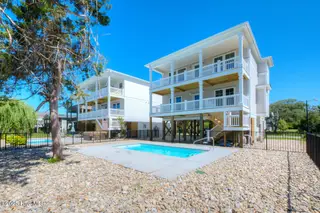 4019 E Pelican Drive, Oak Island, NC 28465 – photo 3: 4019 E Pelican Dr Oak Island-large-002-0