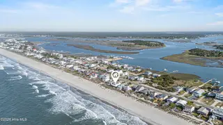 5127 W Beach Drive, Oak Island, NC 28465 – photo 2: 74_drone